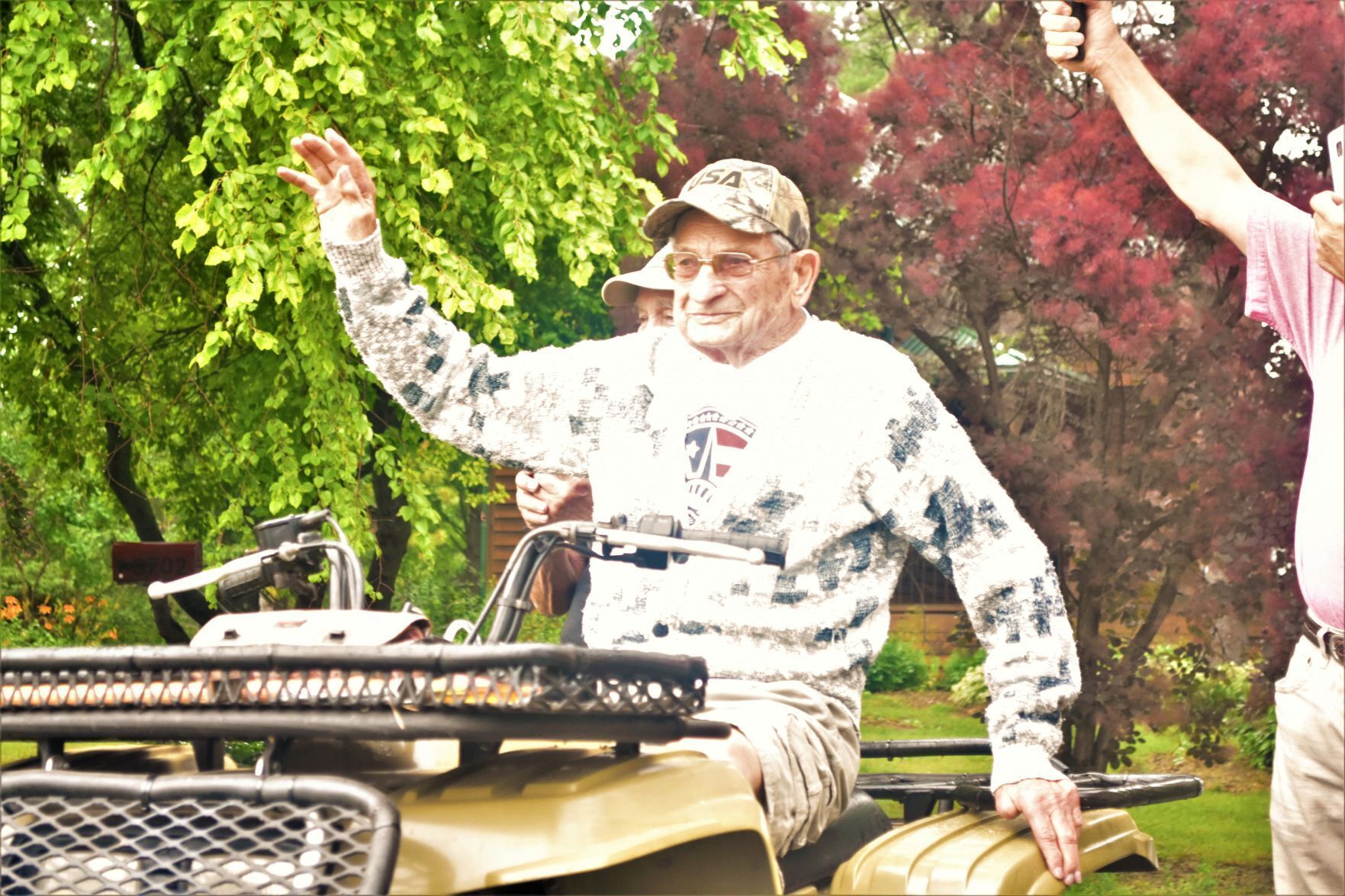Waving to the parade